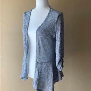 LIGHT PEPLUM SHIMMER BLUE SWEATER